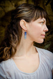 Model wearing night blossoms earrings